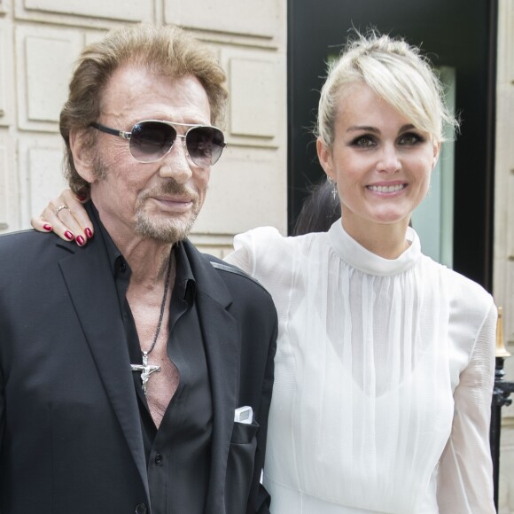 Johnny Hallyday et sa femme Laeticia Hallyday - People au défilé de mode Haute-Couture automne-hiver 2016/2017 "Christian Dior" à Paris. Le 4 juillet 2016