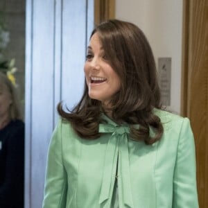 La duchesse Catherine de Cambridge, enceinte de huit mois, à la Société royale de médecine à Londres le 21 mars 2018 pour un symposium qu'elle a organisé avec la Fondation royale sur l'intervention précoce pour la santé mentale des enfants.