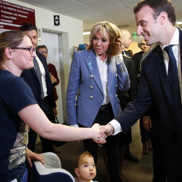 Le président de la République Emmanuel Macron et sa femme la Première Dame Brigitte Macron (Trogneux) - Le couple présidentiel effectuent un déplacement dans un service hospitalier spécialisé dans la détection précoce des enfants autistes à Rouen, France, le 5 avril 2018. © Christophe Ena/Pool/Bestimage