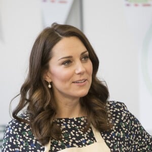 La duchesse Catherine de Cambridge, enceinte, à Londres le 22 mars 2018 lors de son dernier engagement officiel avant le début de son congé maternité.