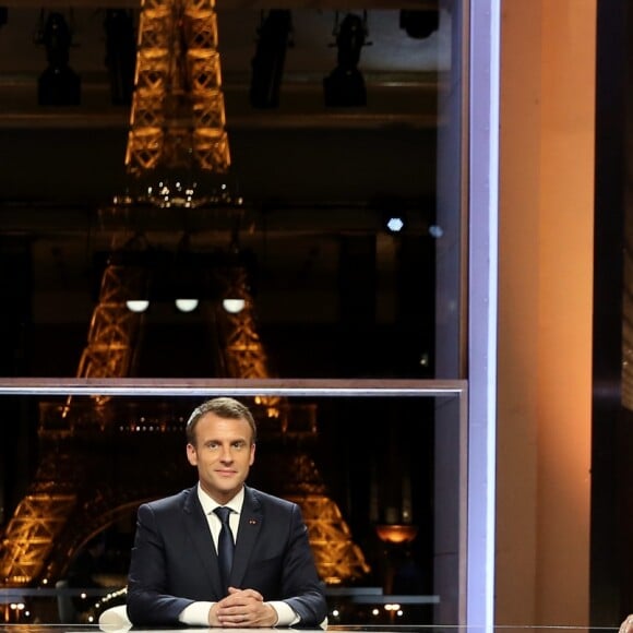 Le président de la République Emmanuel Macron lors de son interview en direct par les journalistes Jean-Jacques Bourdin, pour BFMTV et RMC, et Edwy Plenel, directeur de Mediapart au palais Chaillot, à Paris, France, le 15 avril 2018. © Dominique Jacovides/Bestimage
