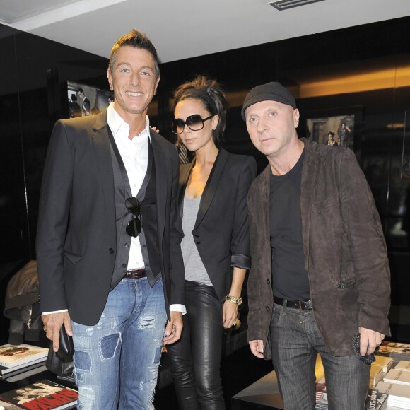 Stefano Gabbana, Victoria Beckham et Domenico Dolce à Milan. Mai 2009.