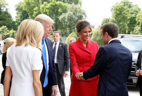 Le président de la République Emmanuel Macron, sa femme Brigitte Trogneux, le président des Etats-Unis Donald Trump et sa femme Melania Trump lors de la cérémonie d'accueil du président des Etats-Unis à l'Hôtel National des Invalides à Paris le 13 juillet 2017. © Dominique Jacovides/Bestimage