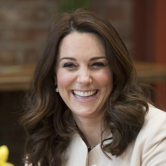 La duchesse Catherine de Cambridge à Londres le 22 mars 2018 lors de son dernier engagement officiel avant son départ en congé maternité pour la naissance de son troisième enfant avec le prince William.