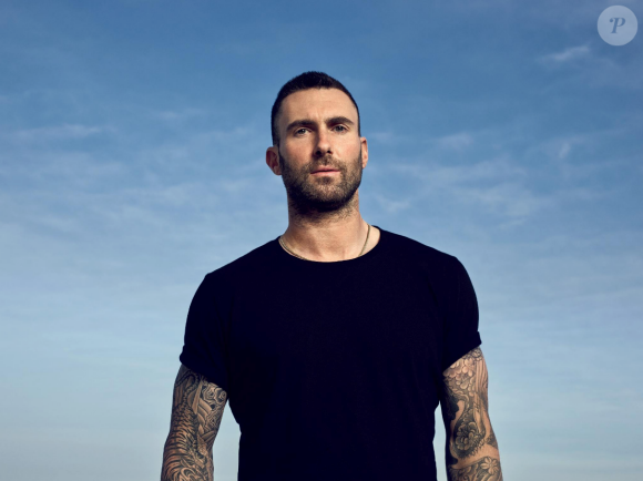 Adam Levine, visage du parfum "Y" d'Yves Saint Laurent. Mai 2018.