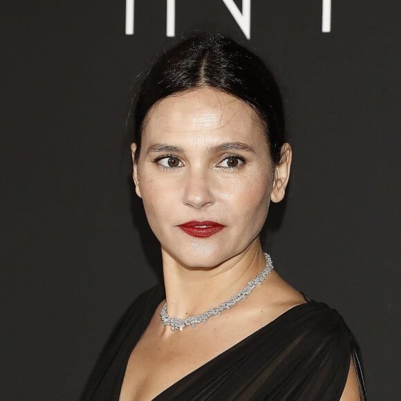 Virginie Ledoyen au photocall du dîner "Kering: Women in Motion Awards", qui a lieu Place de la Castre, lors du 71ème Festival International du Film de Cannes, le 13 mai 2018.