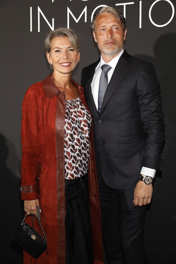 Mads Mikkelsen et sa femme Hanne Jacobsen au photocall du dîner "Kering: Women in Motion Awards", qui a lieu Place de la Castre, lors du 71ème Festival International du Film de Cannes, le 13 mai 2018.