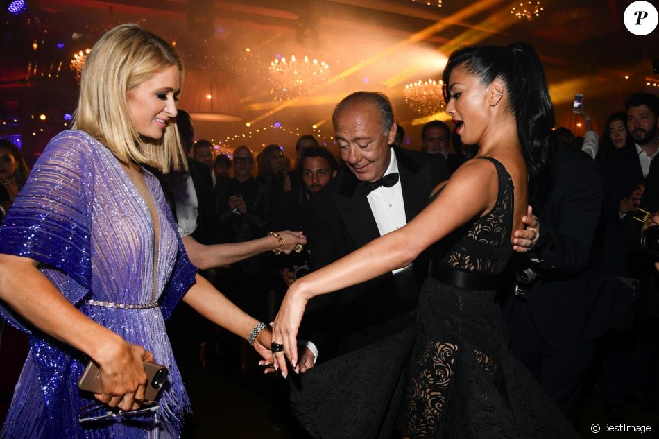Paris Hilton, Fawaz Gruosi, Nicole Scherzinger lors de la soirée du