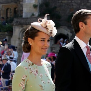 Pippa Middleton et son mari James Matthews arrivent à la chapelle St. George pour le mariage du prince Harry et de Meghan Markle au château de Windsor, Royaume Uni, le 19 mai 2018.