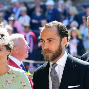 Pippa Middleton, son mari James Matthews et son frère James Middleton arrivent à la chapelle St. George pour le mariage du prince Harry et de Meghan Markle au château de Windsor, Royaume Uni, le 19 mai 2018.