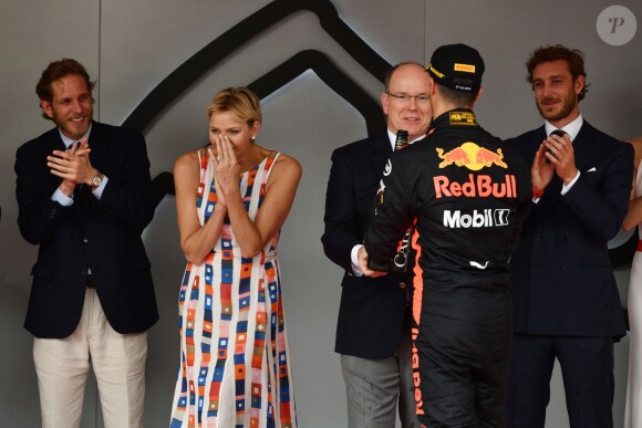 Andrea Casiraghi, la princesse Charlene de Monaco, le prince Albert II de Monaco, Pierre Casiraghi félicitent le trio de tête du 76e Gran Prix de Formule 1 de Monaco remporté par Daniel Ricciardo suivi de Sebastian Vettel et Lewis Hamilton, le 27 mai 2018. © Bruno Bebert/Bestimage