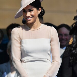 Meghan Markle, duchesse de Sussex, lors de la garden party pour les 70 ans du prince Charles au palais de Buckingham à Londres. Le 22 mai 2018