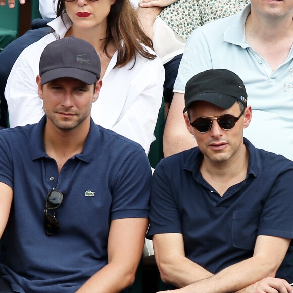 Marc-Olivier Fogiel et mari François Roelants dans les tribunes lors de la finale homme des Internationaux de Tennis de Roland-Garros à Paris le 11 juin 2017. © Dominique Jacovides-Cyril Moreau/Bestimage