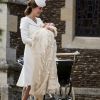 La duchesse Catherine de Cambridge (Kate Middleton) en Alexander McQueen au baptême de sa fille la princesse Charlotte de Cambridge le 5 juillet 2015 à Sandringham.