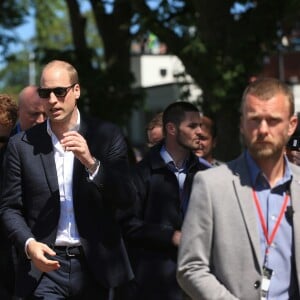 Le prince William, duc de Cambridge, sur les lieux du Tourist Trophy de l'île de Man lors de sa visite de l'île le 6 juin 2018. Fan de moto, il a joint l'utile et l'agréable.