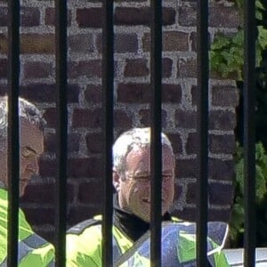 Le prince George de Cambridge sur la moto d'un policier de la ville de Londres le 24 mai 2016.