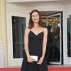 Olga Kurylenko (habillée en Dior) - Photocall du 2ème jour du Festival du film de Cabourg, France, le 14 juin 2018. © Coadic Guirec/Bestimage
