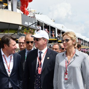 Christian Estrosi (le maire de Nice et vice président du Conseil Régional de PACA), le prince Albert II de Monaco et la princesse Charlène de Monaco durant le Grand Prix de France au Castellet le 24 juin 2018. C. Estrosi (le maire de Nice et le vice président du Conseil Regional de PACA) est à l'origine du retour du Grand Prix de France au Circuit Paul Ricard. C'est L. Hamilton qui a remporté le Grand Prix devant M. Verstappen, second, et K. Raikkonen troisième. © Bruno Bebert / Bestimage