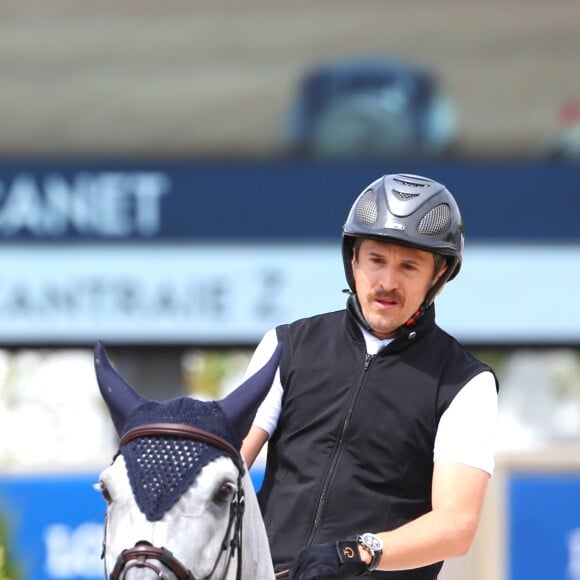 Guillaume Canet sur Wouest de Cantraie Z - Piste - Prix Mairie de Paris - Longines Paris Eiffel Jumping au Champ de Mars à Paris, le 5 juillet 2018.