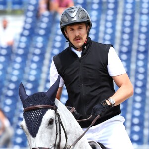 Guillaume Canet sur Wouest de Cantraie Z - Piste - Prix Mairie de Paris - Longines Paris Eiffel Jumping au Champ de Mars à Paris, le 5 juillet 2018.