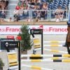 Christian Ahlmann sur Ailina lors de l'épreuve record de saut en hauteur, Six Bar Renault Mobility lors du Longines Paris Eiffel Jumping au Champ de Mars à Paris le 5 juillet 2018