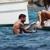 Lionel Messi se relaxe en vacances en famille à bord d'un yacht à Formentera en Espagne le 18 juillet 2018.
