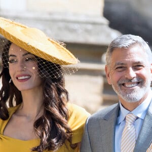 George Clooney et sa femme Amal Alamuddin Clooney - Les invités à la sortie de la chapelle St. George au château de Windsor, Royaume Uni, le 19 mai 2018.