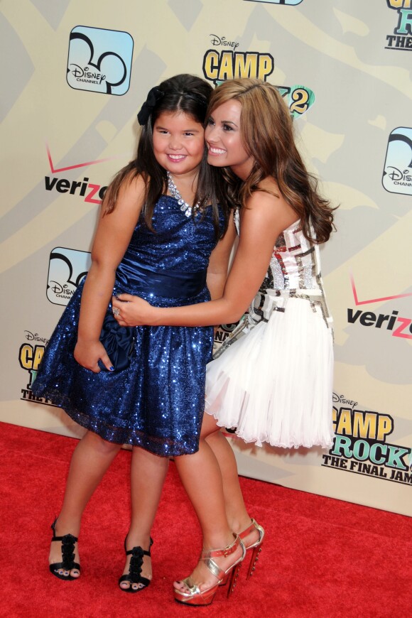 Demi Lovato et sa demi-soeur Madison De La Garza en 2010.