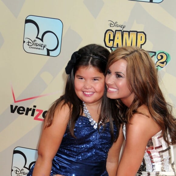 Demi Lovato et sa demi-soeur Madison De La Garza en 2010.