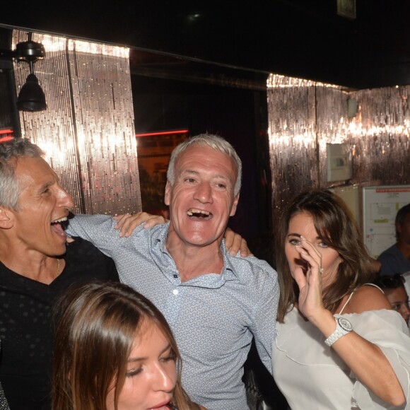 Semi-Exclusif - Didier Deschamps fête sa victoire avec sa femme Claude, Nagui et sa femme Mélanie Page et des amis à la Gioia et au VIP Room à Saint-Tropez, le 21 juillet 2018. © Rachid Bellak/Bestimage