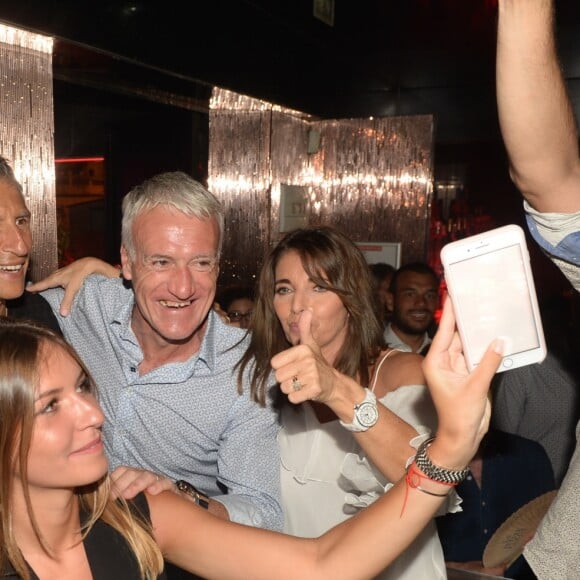 Semi-Exclusif - Didier Deschamps fête sa victoire avec sa femme Claude, Nagui et sa femme Mélanie Page et des amis à la Gioia et au VIP Room à Saint-Tropez, le 21 juillet 2018. © Rachid Bellak/Bestimage