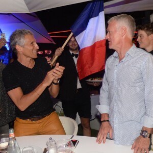 Semi-Exclusif - No web - No blog - Didier Deschamps fête sa victoire avec sa femme Claude, Nagui et sa femme Mélanie Page et des amis à la Gioia et au VIP Room à Saint-Tropez, le 21 juillet 2018. © Rachid Bellak/Bestimage  For Germany call for price !!! NO WEB NO BLOG !!! Semi-Exclusive - French football manager Didier Deschamps is celebrating his FIFA World Cup victory with his wife Claude and and french presenter Nagui and his wife at the Gioia restaurant and VIP Room in Saint-Tropez, France, on July 22nd 201821/07/2018 - Saint-Tropez