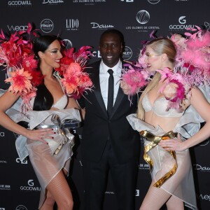 Omar Sy au photocall de la 11ème cérémonie des Globes de Cristal au Lido à Paris le 30 janvier 2017. © CVS / Bestimage