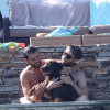 Exclusif - Christophe Beaugrand et son mari Ghislain Gerin en vacances avec des amis et leur chienne Colby à Saint-Tropez le 31 juillet 2018.