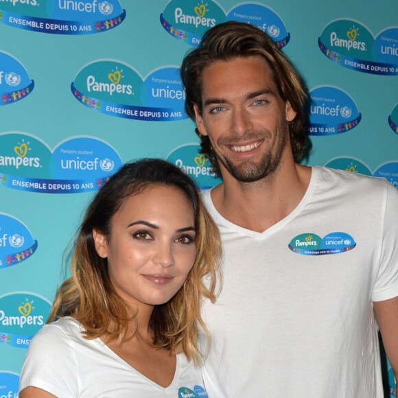 Camille Lacourt et son ex femme Valérie Bègue sont les parrain et marraine du 10ème anniversaire du partenariat entre Pampers et l'Unicef pour le vaccin des enfants contre le tétanos, organisé à Paris le 13 novembre 2015.