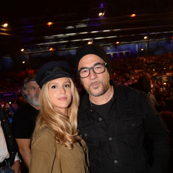 Pascal Obispo et sa compagne Julie Hantson - Célébrités lors du deuxième combat professionnel "La conquête" entre le français T. Yoka et l'américain J. Rice au Zénith de Paris, France, le 14 octobre 2017. Tony remporte aux points son deuxième combat professionnel contre l'Américain. © Rachid Bellak/Bestimage