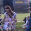 La duchesse Catherine de Cambridge et ses enfants le prince George et la princesse Charlotte de Cambridge au Beaufort Polo Club à Tetbury le 10 juin 2018.