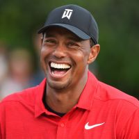 Tiger Woods : Baiser de la victoire avec sa chérie Erica Herman