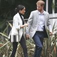 Le prince Harry, duc de Sussex, et Meghan Markle, duchesse de Sussex, enceinte, se rendent au "Domain", un espace ouvert de 34 hectares à Sydney, le 21 octobre 2018.