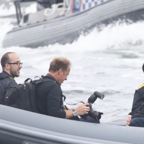 Le prince Harry, duc de Sussex, et Meghan Markle, duchesse de Sussex, enceinte, assistent à une régate lors des "Invictus Games 2018" à Sydney, le 21 octobre 2018.