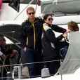 Le prince Harry, duc de Sussex, et Meghan Markle, duchesse de Sussex, enceinte, assistent à une régate lors des "Invictus Games 2018" à Sydney, le 21 octobre 2018.