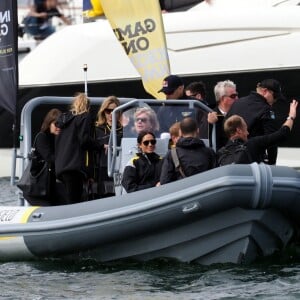 Le prince Harry, duc de Sussex, et Meghan Markle, duchesse de Sussex, enceinte, assistent à une régate lors des "Invictus Games 2018" à Sydney, le 21 octobre 2018.