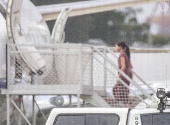 Meghan Markle, duchesse de Sussex, enceinte, à l'aéroport de Sydney. Le 21 octobre 2018.