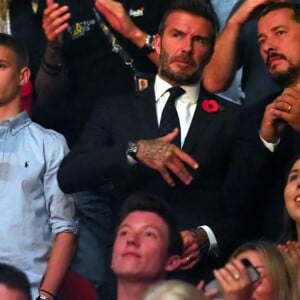 David Beckham et son fils Romeo assistent à la cérémonie de clôture des Invictus Games 2018 à Sydney, le 27 octobre 2018.