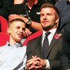 David Beckham et son fils Romeo assistent à la cérémonie de clôture des Invictus Games 2018 à Sydney, le 27 octobre 2018.