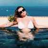 Camille Gottlieb, fille de la princesse Stéphanie de Monaco, dans une piscine à Fontvieille, Monaco, sur Instagram le 29 juillet 2018.