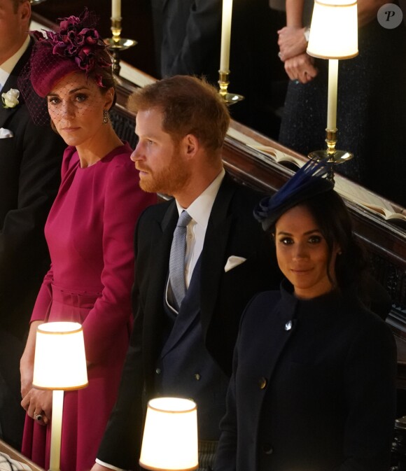 Kate Middleton, duchesse de Cambridge, Le prince Harry, duc de Sussex, et Meghan Markle, duchesse de Sussex - Cérémonie de mariage de la princesse Eugenie d'York et Jack Brooksbank en la chapelle Saint-George au château de Windsor, Royaume Uni le 12 octobre 2018.