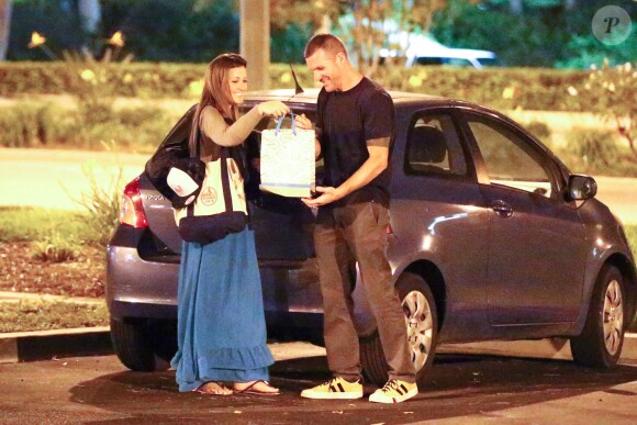 Tim Commerford de Rage Against the Machine en octobre 2004 à Los Angeles lors d'une soirée avec une jeune femme autre que son épouse Aleece Dimas.