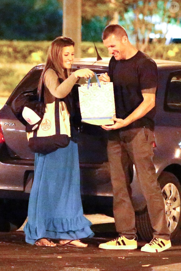 Tim Commerford de Rage Against the Machine en octobre 2004 à Los Angeles lors d'une soirée avec une jeune femme autre que son épouse Aleece Dimas.