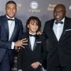 Kylian Mbappé (Paris Saint-Germain Trophée Kopa, recomposant le meilleur joueur de moins de 21 ans) avec son père Wilfried et son frère Ethan - Tapis rouge de la cérémonie du Ballon d'or France Football 2018 au Grand Palais à Paris, France, le 3 décembre 2018. © Cyril Moreau/Bestimage